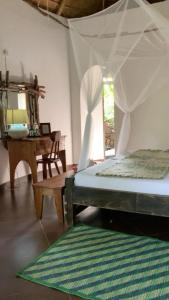 Mabamba Lodge客房内的一张或多张床位