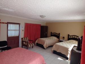 Hostal Aramayo客房内的一张或多张床位