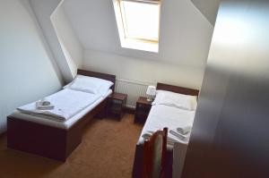 Penzion Batovka u Hoffera客房内的一张或多张床位