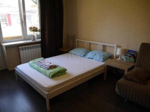 Квартира в "зеленом" районе Москвы客房内的一张或多张床位
