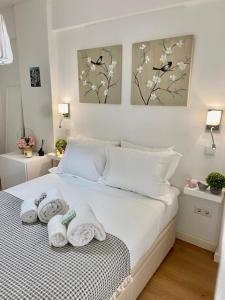 Cosy Avenida Apartment客房内的一张或多张床位