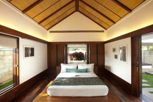 奇克马格尔奇克马加卢尔度假酒店的一间卧室,卧室内配有一张大床