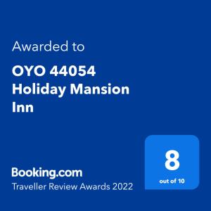 诗巫OYO 44054 Holiday Mansion Inn的手机的屏幕,带给奥假日的短信