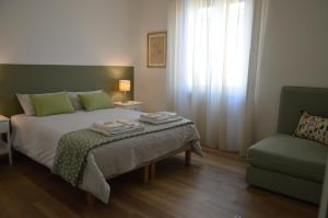 Via Da Velo 8 appartamento客房内的一张或多张床位