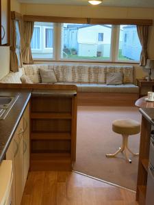 新罗姆尼Cosy Private Caravan Romney Sands Holiday Park的相册照片