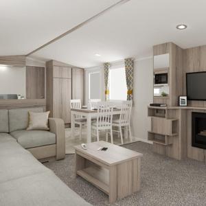 阿伯劳尔The Dram Van - Beautiful, luxury static caravan的带沙发的客厅和用餐室