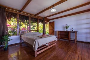 Punta Marenco Lodge客房内的一张或多张床位