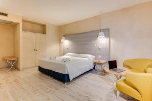 La Tonnara di Bonagia Resort客房内的一张或多张床位