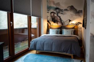 Urbn Dreams II客房内的一张或多张床位