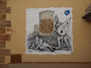 San Marco ArgentanoB&B Del Borgo的墙上画着两个男人的画