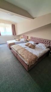 Hotel Ponti客房内的一张或多张床位
