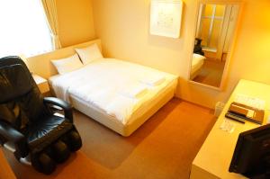 松阪豪阁酒店客房内的一张或多张床位