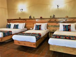 Kaswa Lodge客房内的一张或多张床位