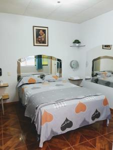 Hospedaje Las Tres Regiones客房内的一张或多张床位