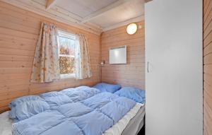 Toftum Bjerge Camping & Cottages客房内的一张或多张床位