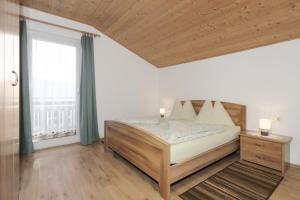 Traterhof-Spinges客房内的一张或多张床位