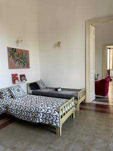 Casa Proserpina客房内的一张或多张床位