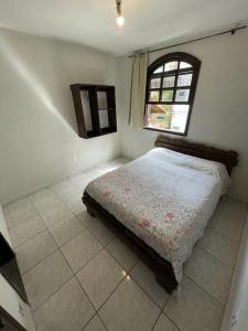 Cantinho em Ouro Preto客房内的一张或多张床位