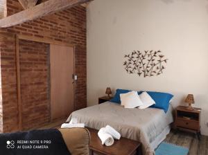 Chalé Lavanda com Hidro, Trilhas e Cachoeiras客房内的一张或多张床位
