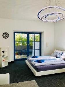 #WORLD Ferienwohnung Schkeuditz客房内的一张或多张床位