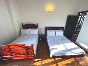El Portón de Enriqueta客房内的一张或多张床位