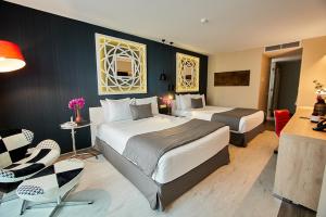 Gran Evenia Panamá Hotel客房内的一张或多张床位