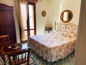 Guest House Al Gattopardo客房内的一张或多张床位