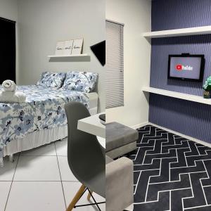 博阿维斯塔Apartamento em Boa Vista的一间卧室配有一张床,墙上配有电视
