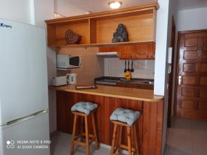 Apartamento ohana的厨房或小厨房