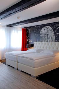 豪斯楚汉萨同盟酒店客房内的一张或多张床位