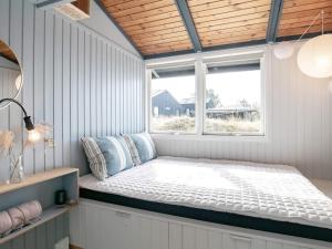 Holiday home Ålbæk LXXXIV客房内的一张或多张床位