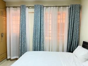 Dream View Apartment- opposite Garden City Mall near Safari Park客房内的一张或多张床位