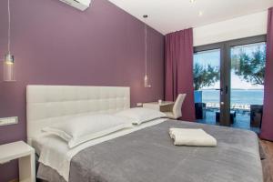 Luxury rooms Beach Mediteran客房内的一张或多张床位