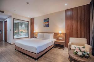 Celina Peninsula Resort Quảng Bình客房内的一张或多张床位