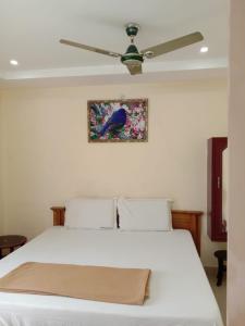 Shubhanga Residency客房内的一张或多张床位