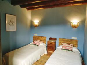 Casa Serra de Dalt客房内的一张或多张床位