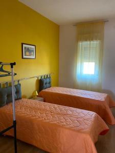 Casa vacanze Sicilia客房内的一张或多张床位