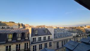 巴黎Appartement Cœur de Paris avec vue sur les toits的相册照片