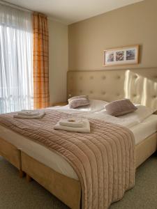 莱克维尔公寓式酒店客房内的一张或多张床位