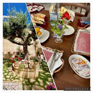法维尼亚纳Guest House Al Gattopardo的一张桌子,上面有盘子和树