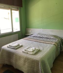 Pensión Casa Corro客房内的一张或多张床位