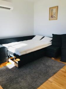 Kastellegården Skanskullen客房内的一张或多张床位