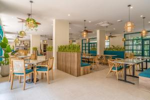 Bliss Hotel Phu Quoc餐厅或其他用餐的地方