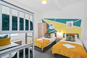 Luxe Holiday Apartments by Sasco客房内的一张或多张床位