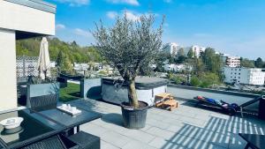 FerienwohnenAmSee Penthouse mit Whirlpool的休息区