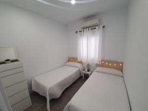 Brisas del mar客房内的一张或多张床位