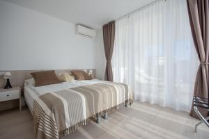 Hotel & Apartments Eldorado客房内的一张或多张床位