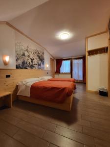 Hotel Raibl e Appartamenti客房内的一张或多张床位