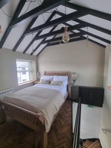 Luxurious Cottage with hot tub, Lake District客房内的一张或多张床位