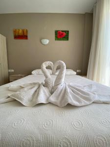 Safak Apart & Hotel客房内的一张或多张床位